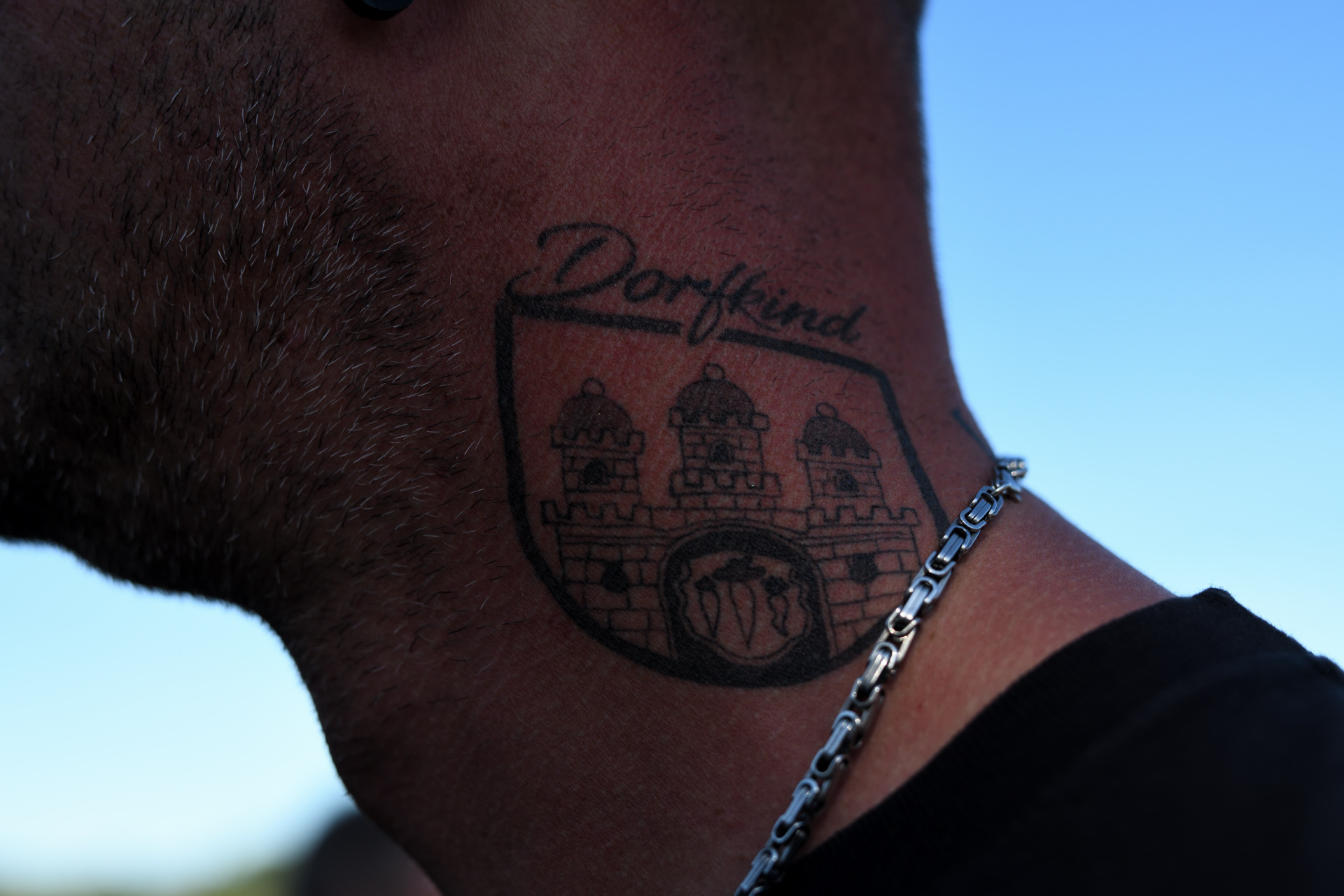 Dorfleben Vereinsmitglied Tattoo